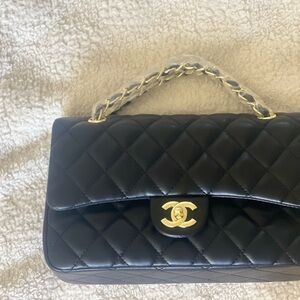 CHANEL Black Quilted Shoulder Bag with Iconic Design